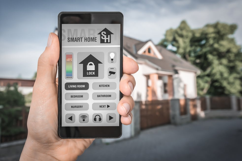 Smart home control app on smartphone - smart home concept